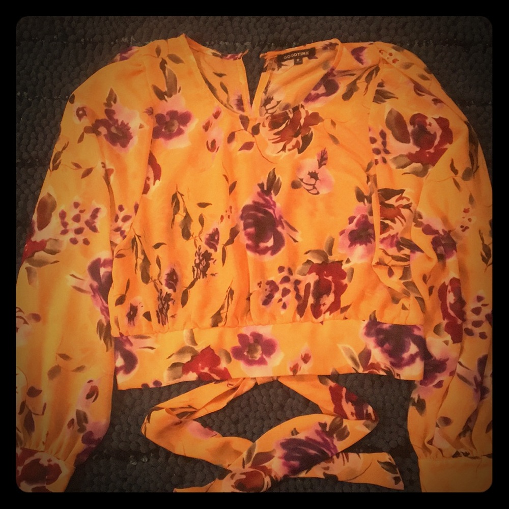 Wrap around floral mid drift top